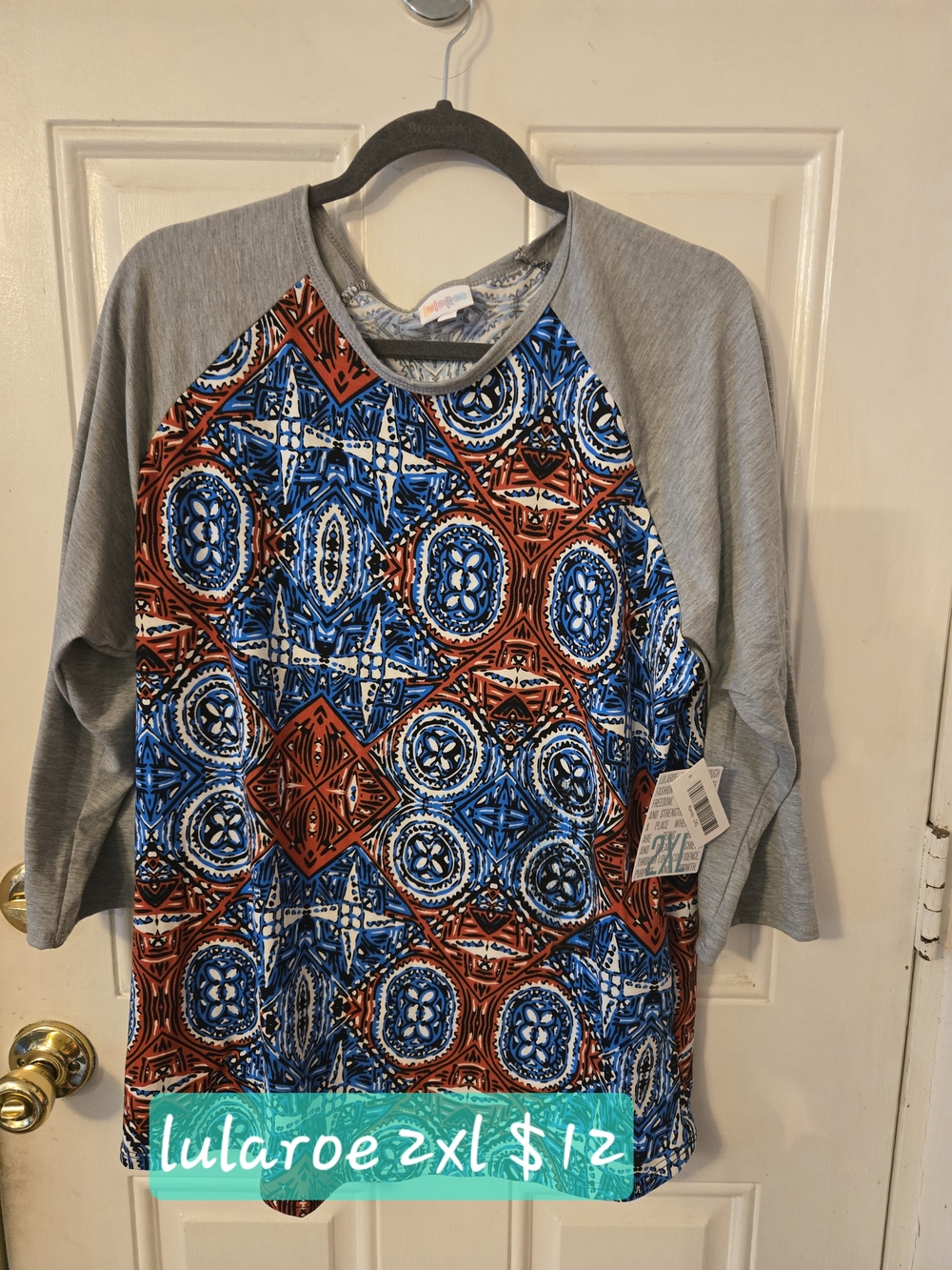 LuLaRoe Long Sleeve Raglan in Blue, Rust & Gray Geometric